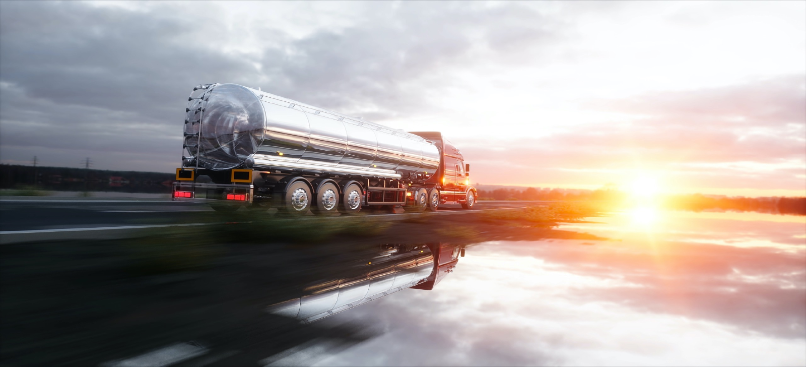 Fuel tanker truck at a fuel storage tank facility